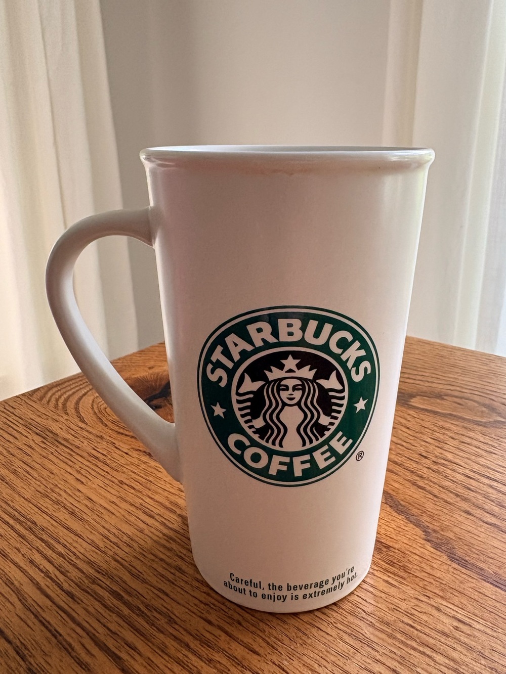 2006 Starbucks Coffee 5.75” tall White Mug with Green Logo- 16 ozs.